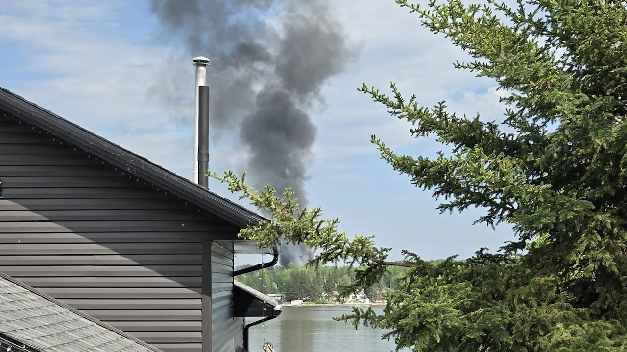 Evacuation order still in effect as officials assess damage from wildfire northwest of Edmonton