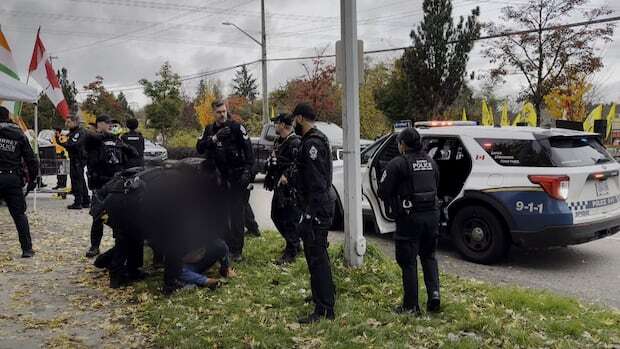 Arrests follow violent clashes outside Hindu temple, Sikh gurdwara