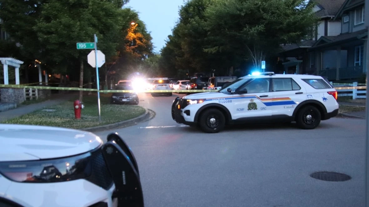 Man killed in police-involved shooting at Surrey, B.C., home where woman found dead