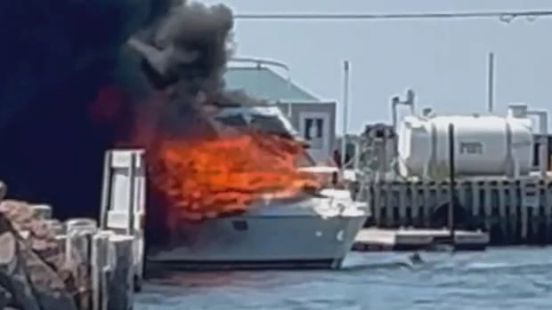 Jet skier jumps in water to save Shediac wharf from burning vessel