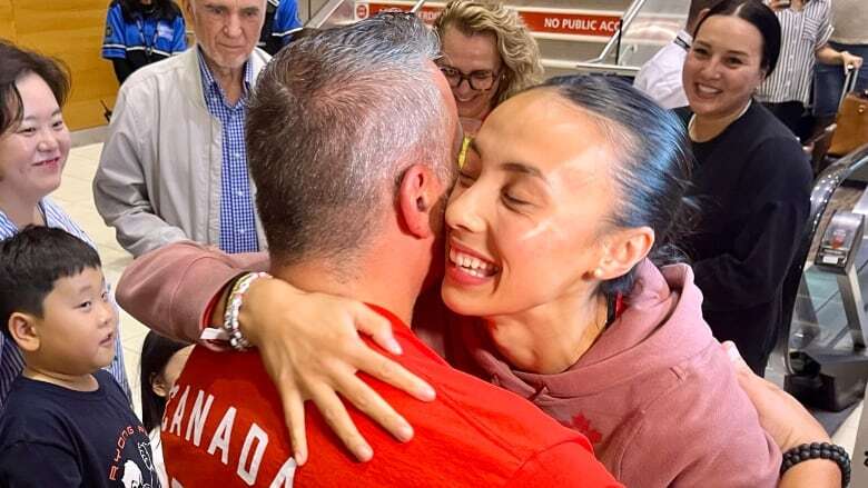 Embraces greet Olympian Skylar Park upon return to Winnipeg