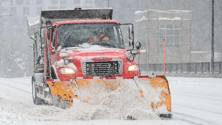 Hundreds of flights cancelled as winter storm dumps another round of snow on Quebec