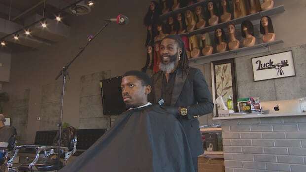 Barber, customer discuss importance of hair to Black identity