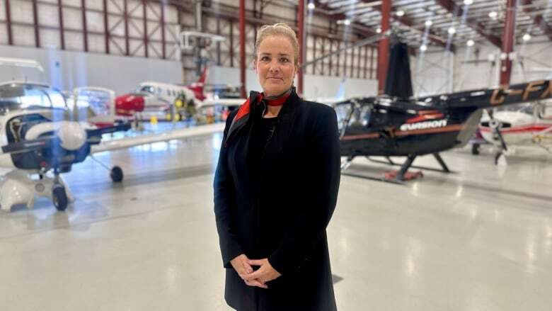 Future flight attendants learn critical evacuation skills on aircraft at Fanshawe College