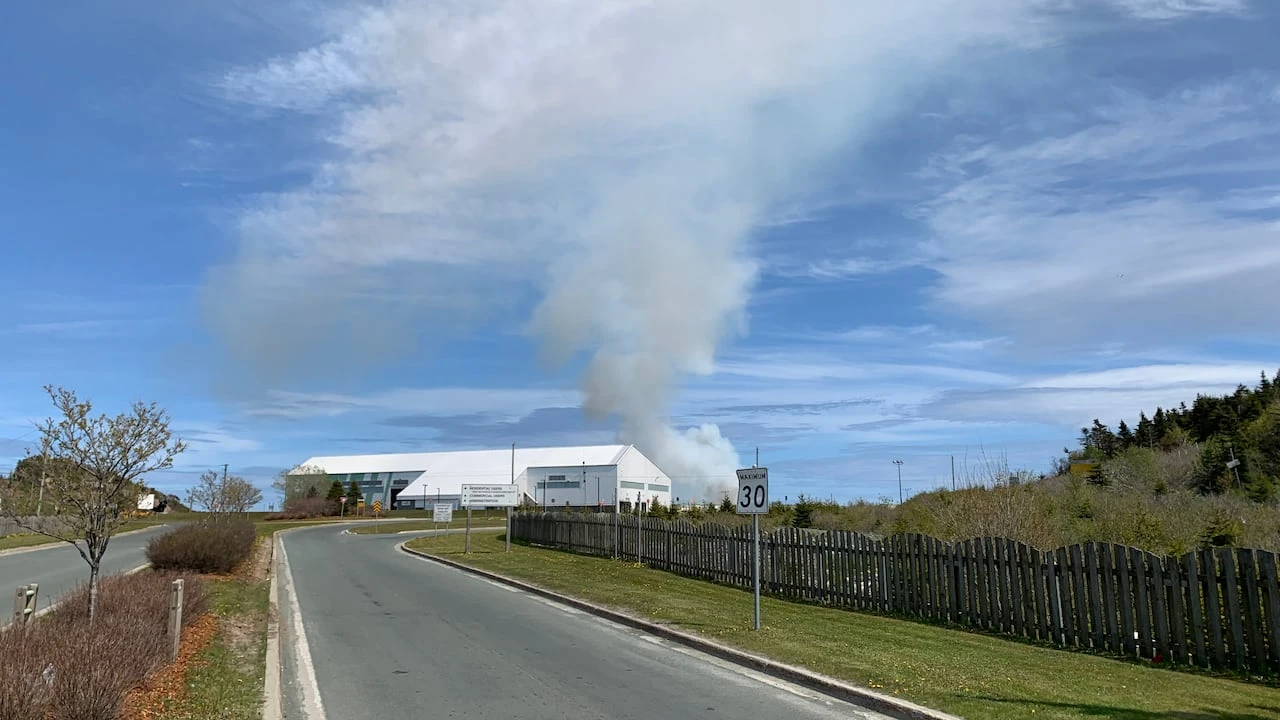 St. John’s dump fire had to be smothered by bulldozers dumping gravel