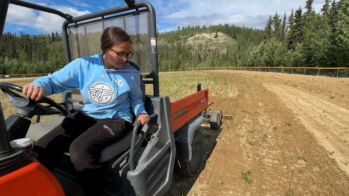 If you weed it, they will come: Workers prepare fields for Yukon's biggest softball tourney