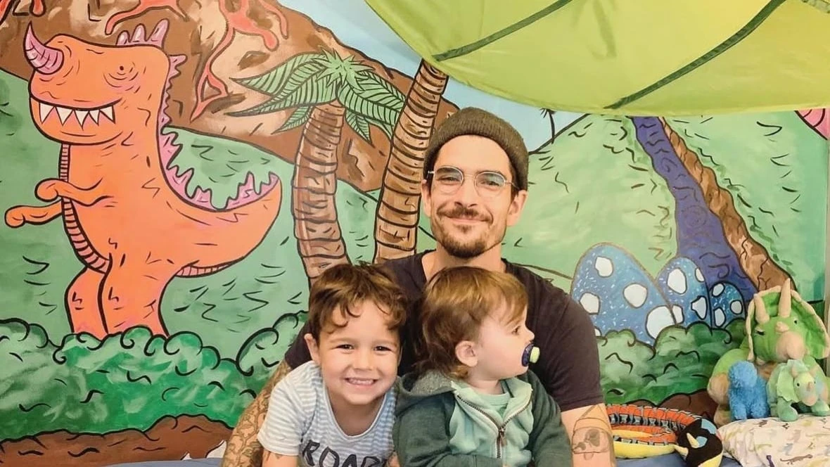 Video of P.E.I. dad painting over his growing son's dinosaur mural goes viral