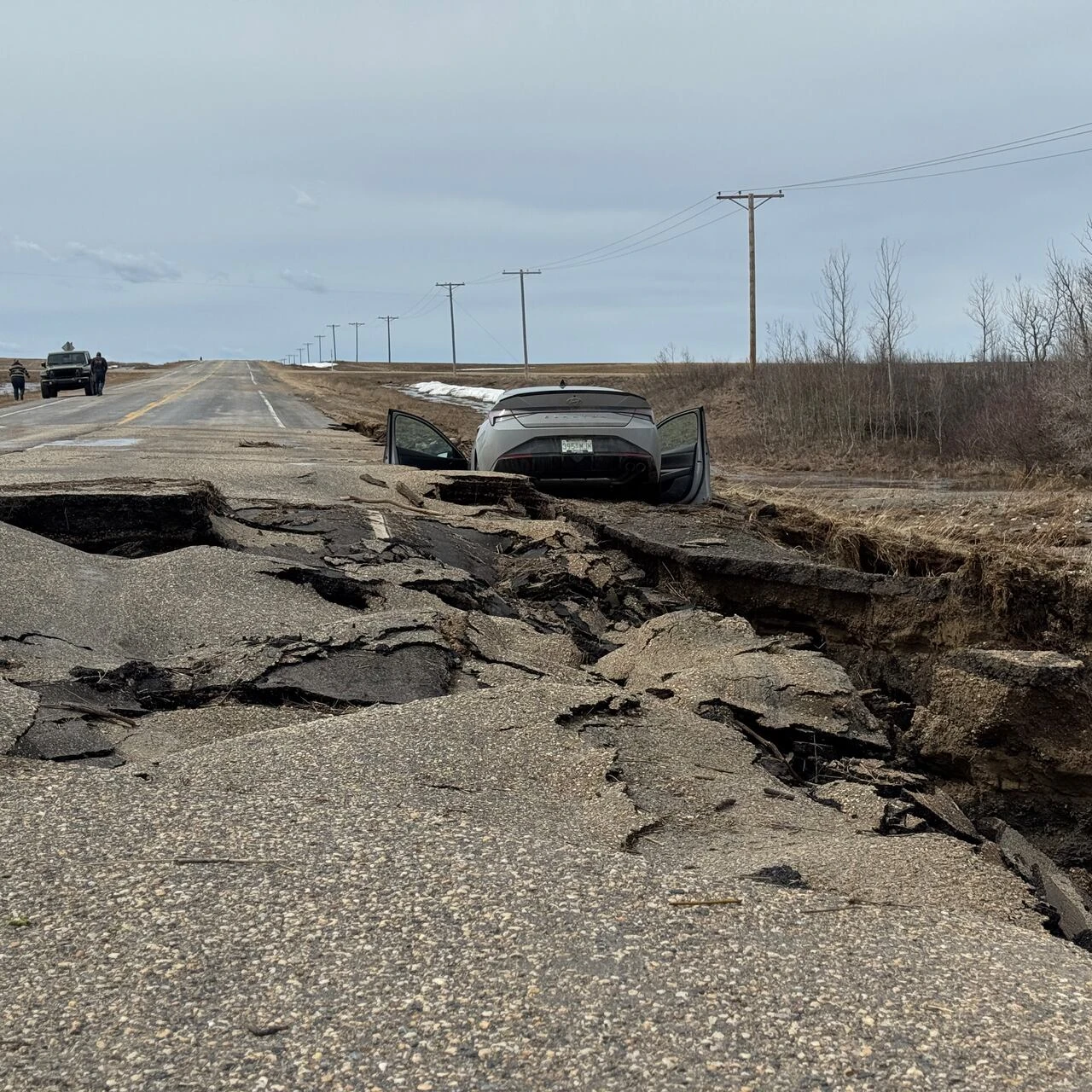 Water floods land scorched by fire, closing only road access to Patuanak, Sask.