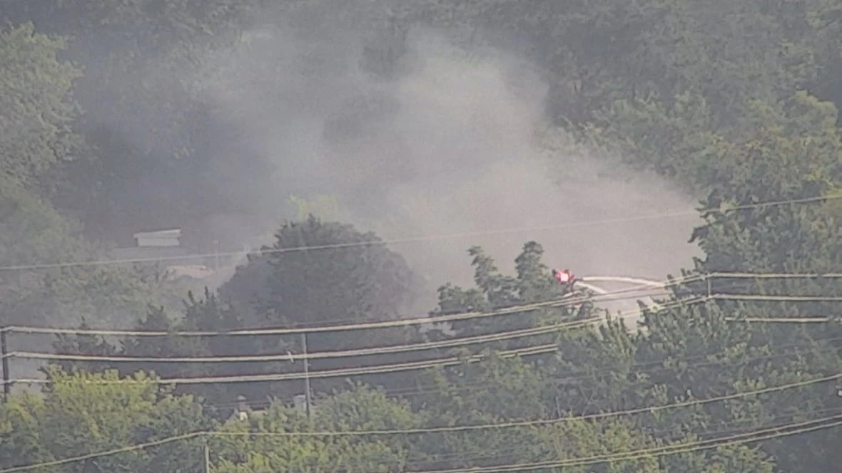 Firefighters responding to fire on Campbell Avenue near College Avenue