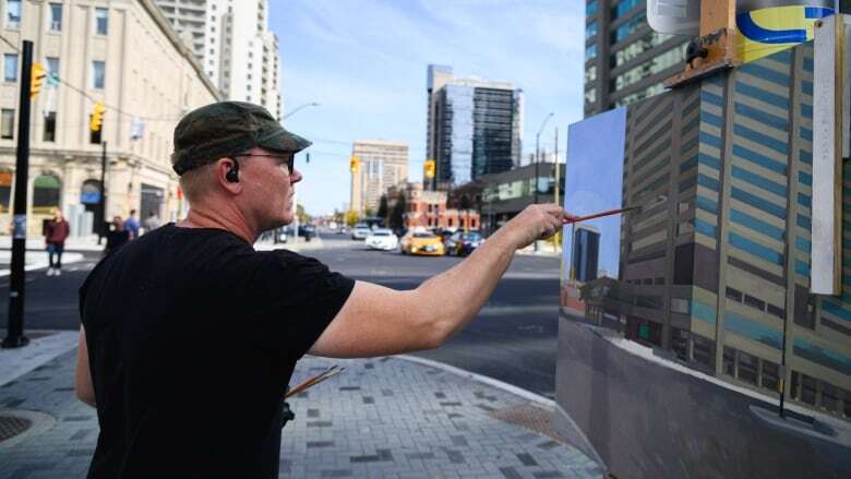 After walking by them for years, London artist is painting City Centre towers