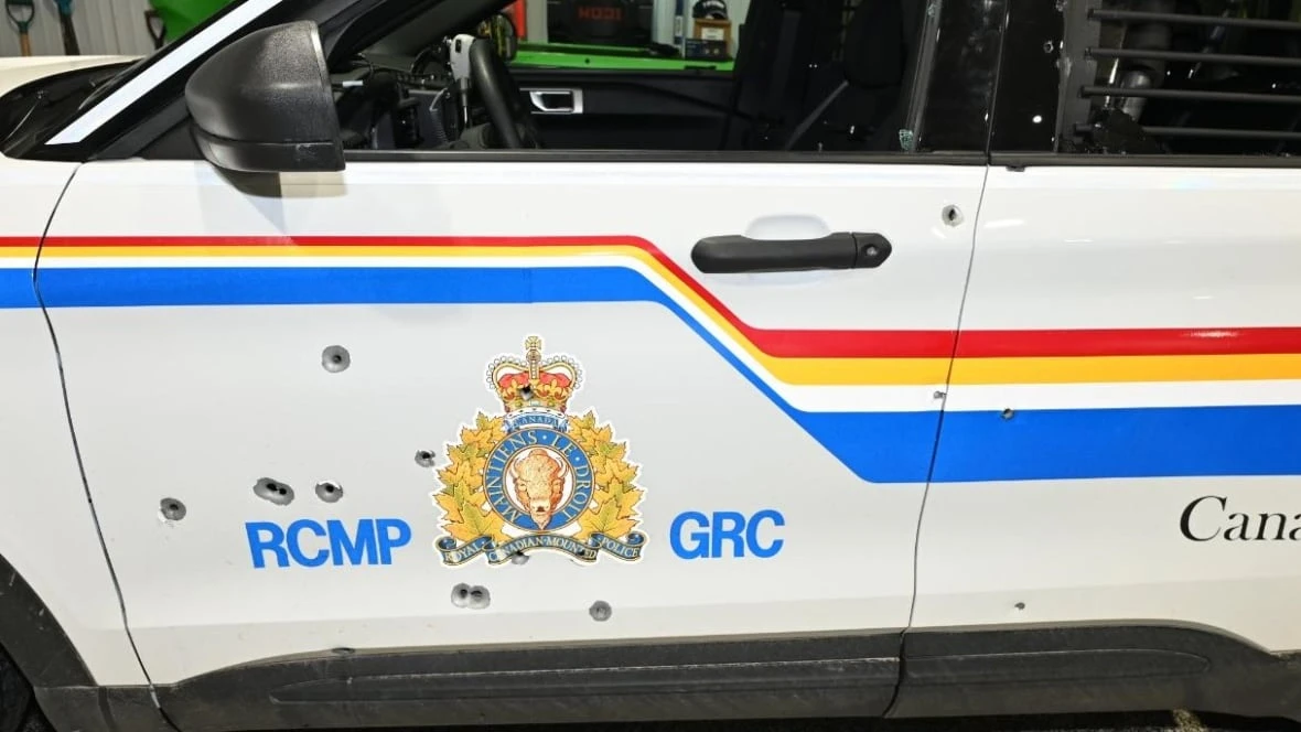 Dozens more charges laid against man accused of shooting at police during standoff
