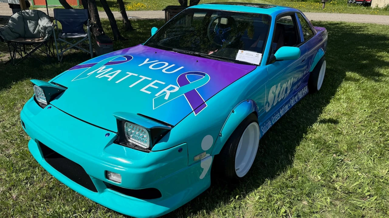 Fort St. John couple driving teal and purple car to destigmatize mental health, prevent suicide