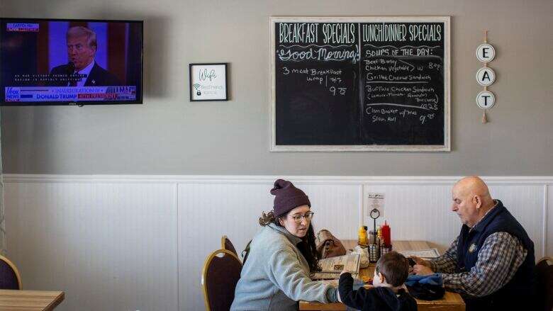 At a friendly diner on the U.S. border, patrons react to Trump's inauguration