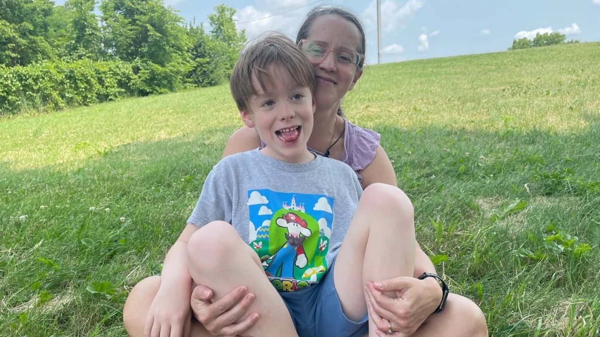 Her autistic son gets help from school support staff. Quebec's budget cuts could take it away