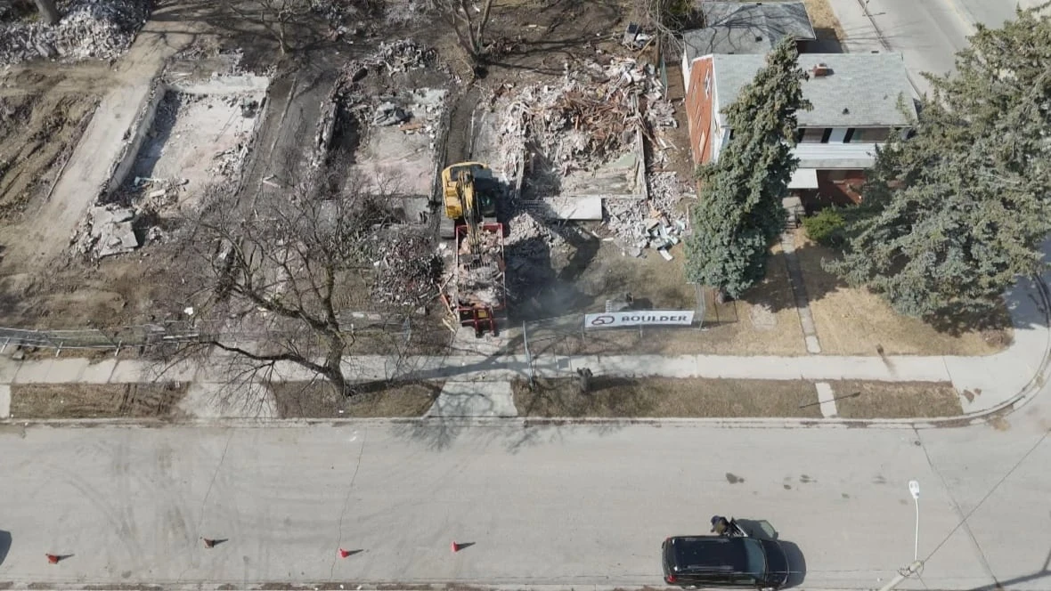Sandwich Town residents hopeful as boarded up buildings come down