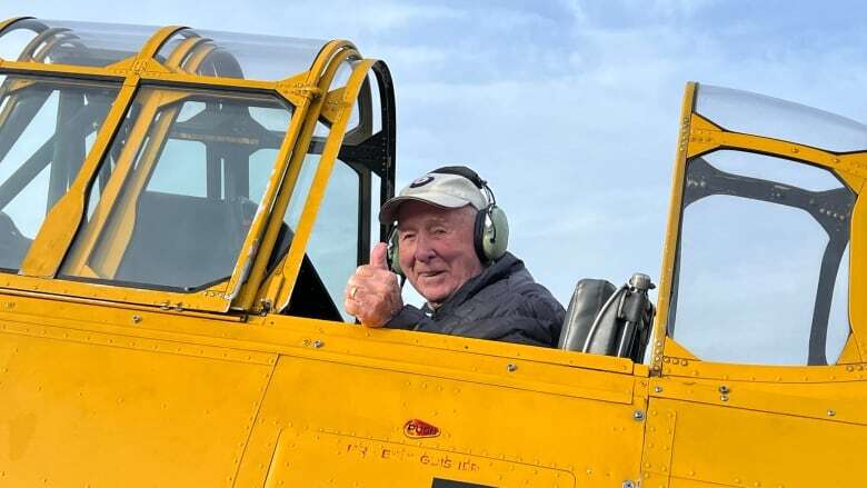 At 101, WWII veteran Spitfire pilot gets another spin in Harvard trainer