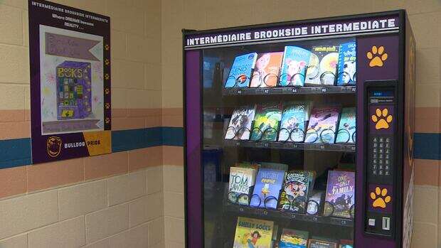 Take a look, it's in a book… vending machine. This school is rewarding students for positive behaviour