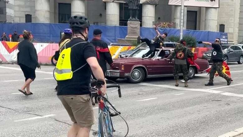 Police 'handled the situation badly,' witness says after driver hits Portage and Main protester