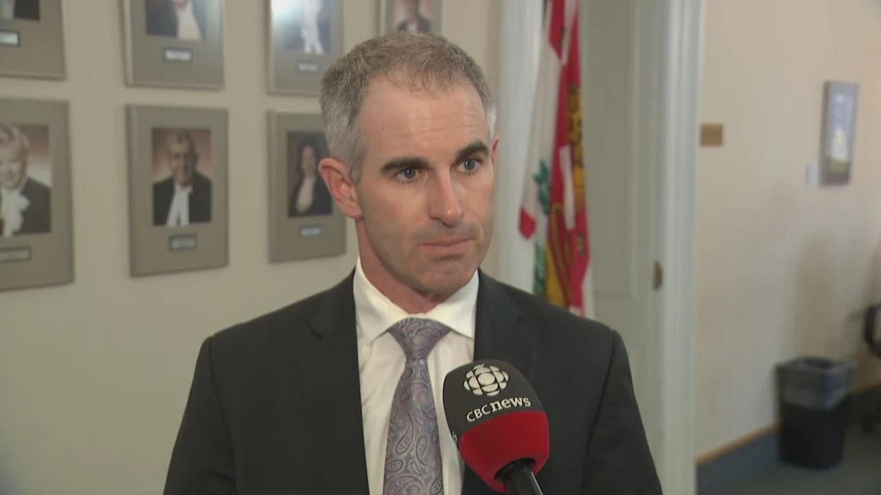 Bill to keep Sidney MacEwen in cabinet shelved as commissioner calls it too broad