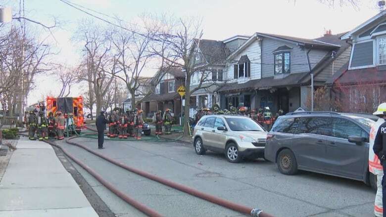 Man in hospital after multi-house fire in Toronto Beaches neighbourhood