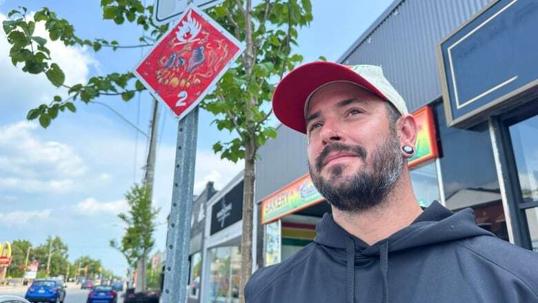 This Windsor artist turns old hazard signs into eye-catching street art