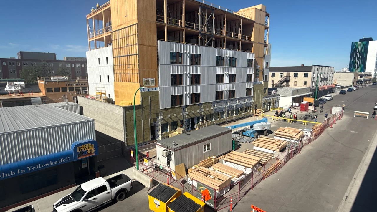 Final beam installed on 50-plex housing development in downtown Yellowknife