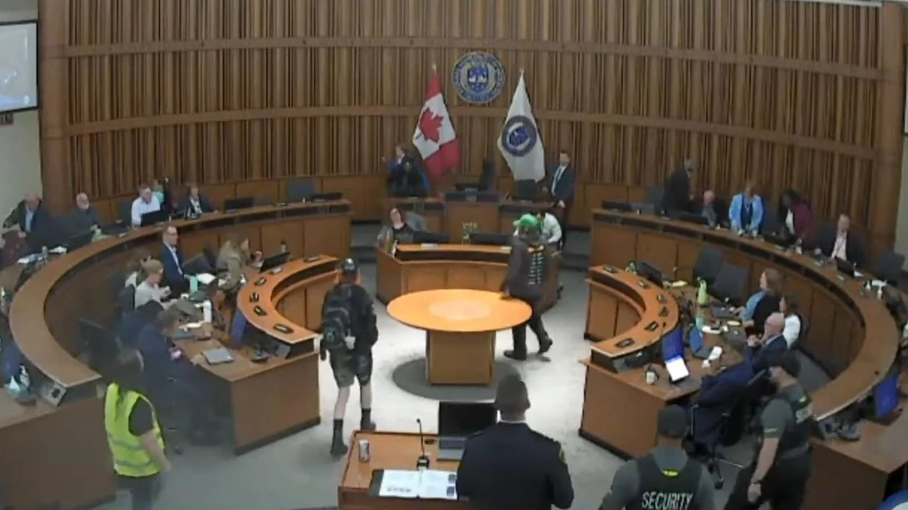 Protesters disrupt regional council meeting over Kitchener encampment decision