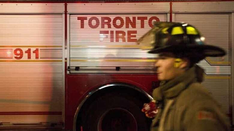 Infant dead, woman in hospital after house fire in Toronto's west end