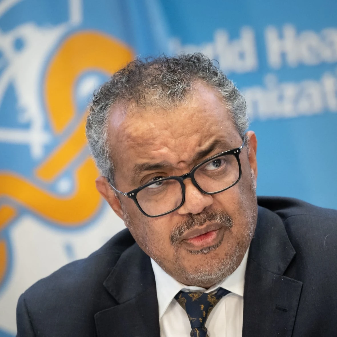 WHO cuts management team in half, scales back operations