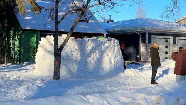 Saskatoon boys embrace winter with giant snow fort in front yard