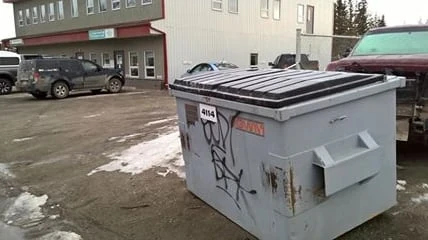 Sarnia fire fighters rescue man from garbage truck after fall from unloading dumpster