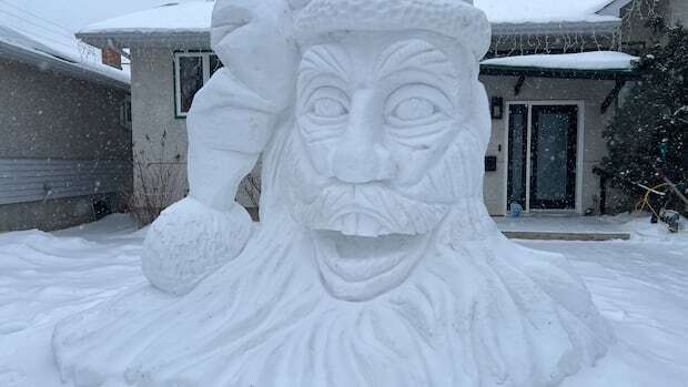 Santa snow sculpture hopes to inspire donations