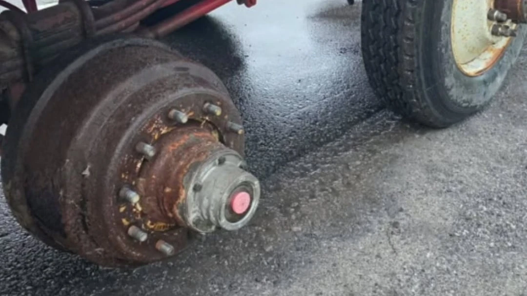 Ottawa police stop truck hauling trailer missing most of its wheels