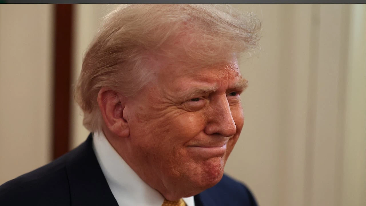 Trump denies writing crude letter to Jeffrey Epstein
