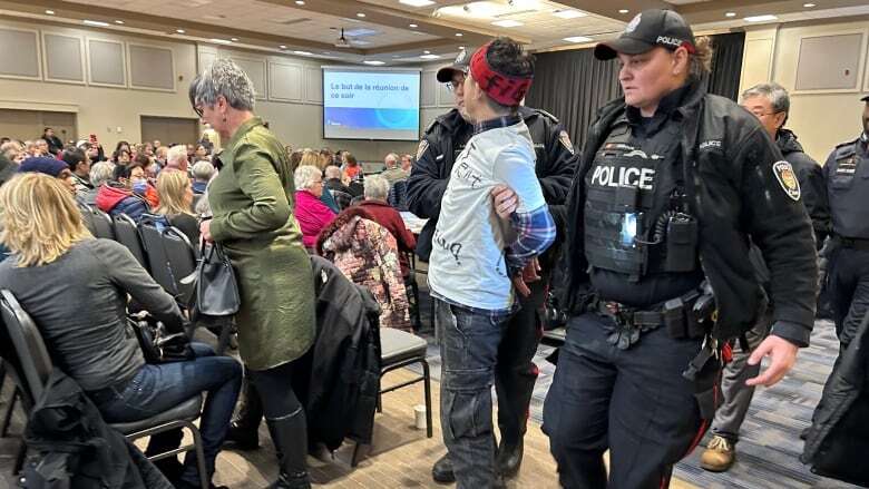 Chaos erupts at asylum seeker structure info session