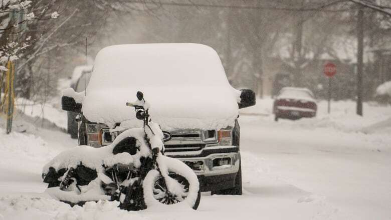 Multiple weather warnings are in effect as significant snowfall continues Monday in northwestern Ontario