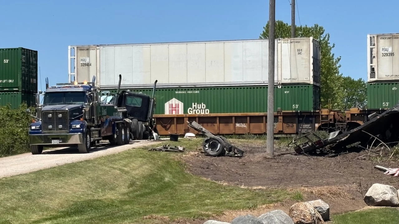 Truck driver seriously hurt after collision with freight train east of London