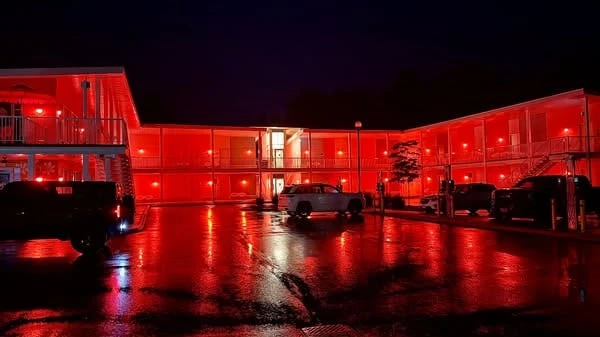Essex County motel hopes new red lights keep keep fish flies at bay