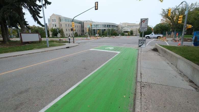 City officially installs painted bike box at intersection where cyclist was killed