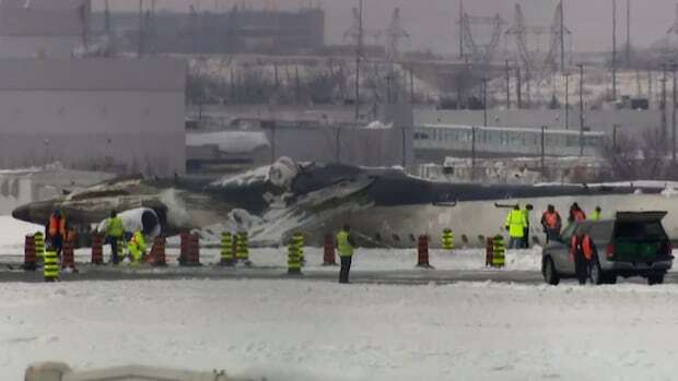 Crews start clearing Delta plane crash wreckage, survivors offered $30K