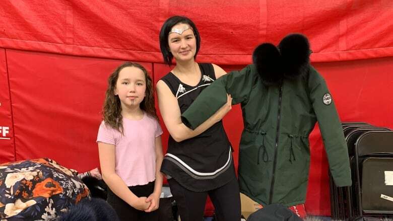 Parkas, kamiit and amautiit shown off in Arviat, Nunavut, fashion show