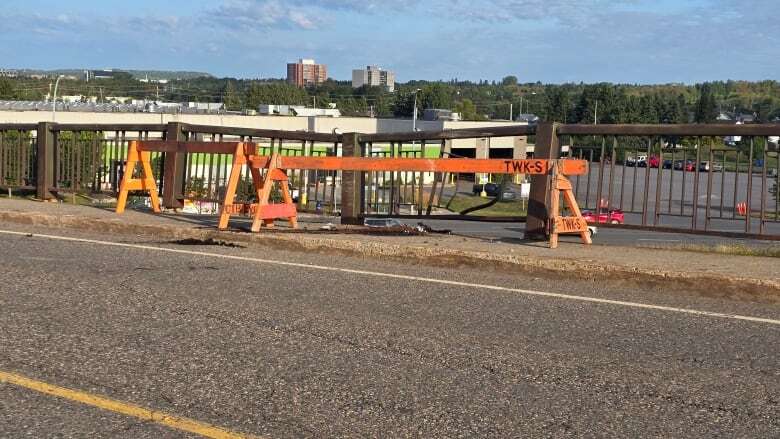 City assessing damage after car collides with Central Avenue bridge guardrail