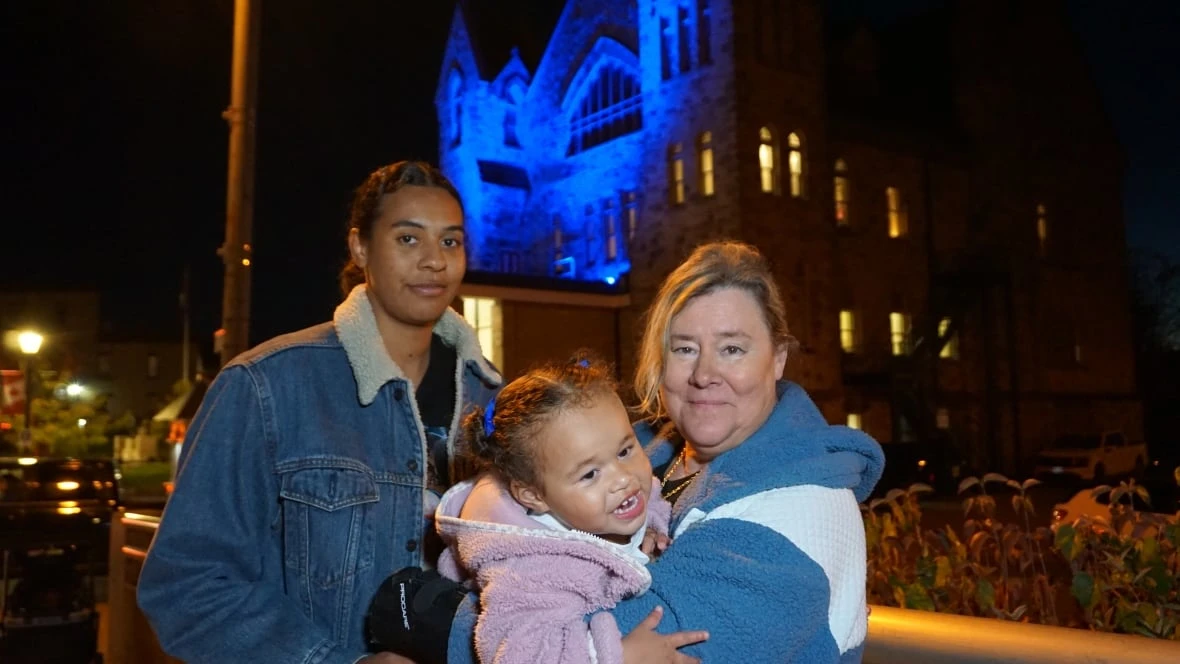 Homes lit blue in tribute to baby boy and his bereaved family