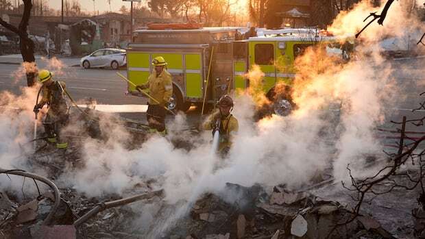 L.A. fires threaten to spread as officials guard against looting