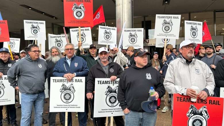 Rail workers rally for better working conditions in Montreal as labour dispute halts trains