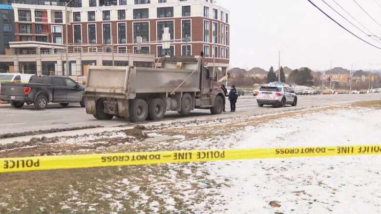 Woman dead after being struck by dump truck in Mississauga, police say