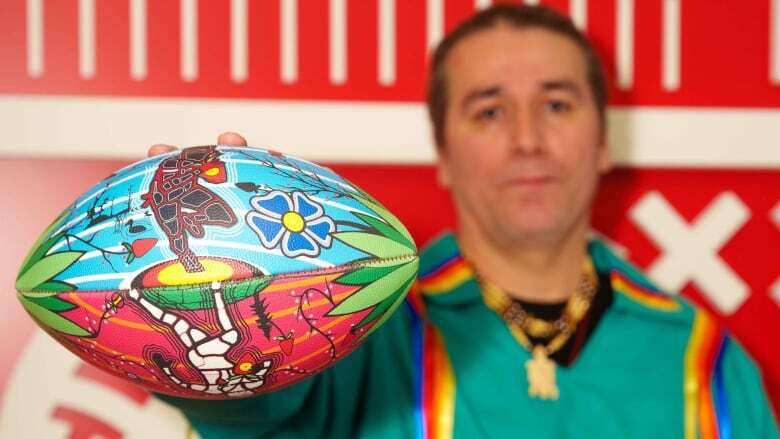 The NFL commissioned this Indigenous artist to decorate a football with art that showcases his culture