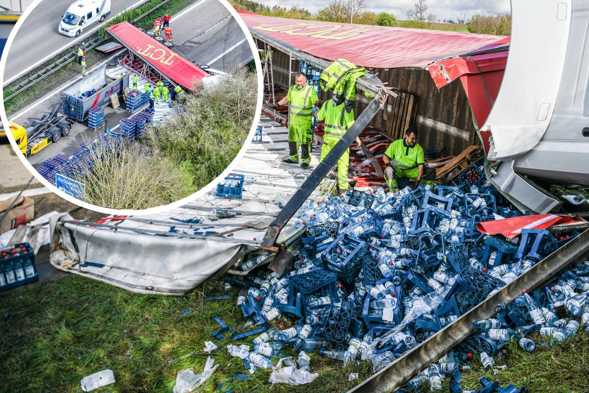 Laster-Fahrer übersieht Mercedes: Hunderte Kisten verteilen sich auf A7!