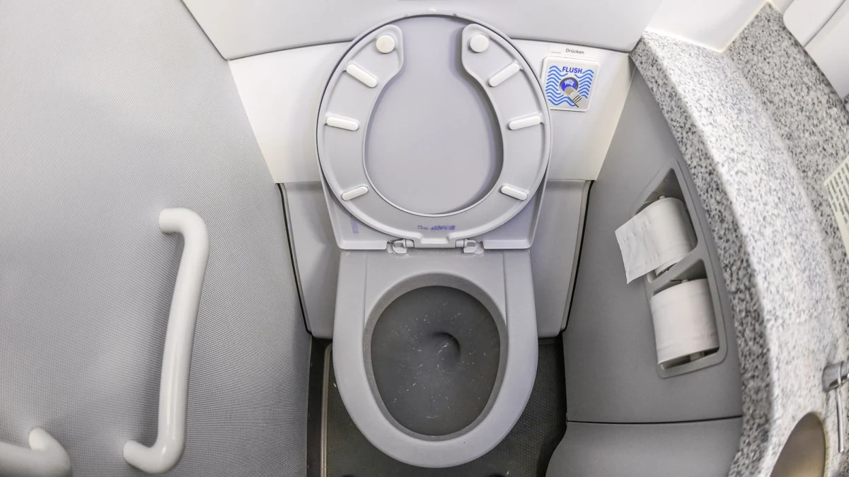 Why airplane toilets are tiny engineering marvels