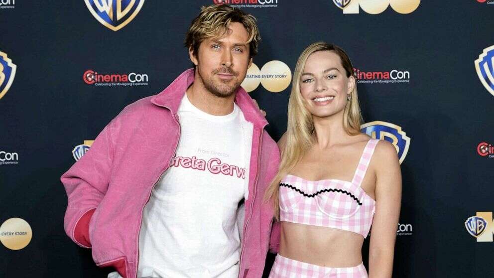 Margot Robbie and Ryan Gosling show off matching pink Barbiecore looks at CinemaConThe 